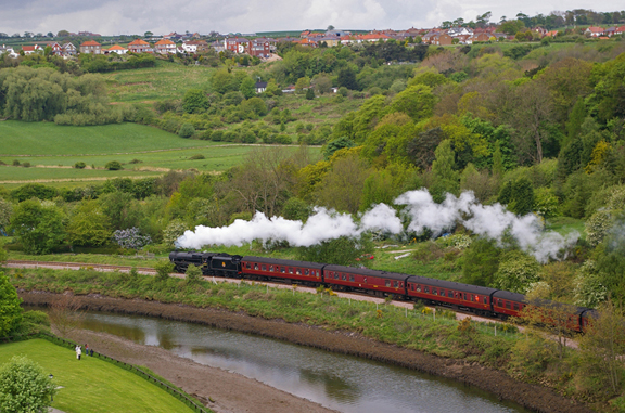 Steam train passing under Larpool Viaduct/photo by Arnold Underwood/May 2009