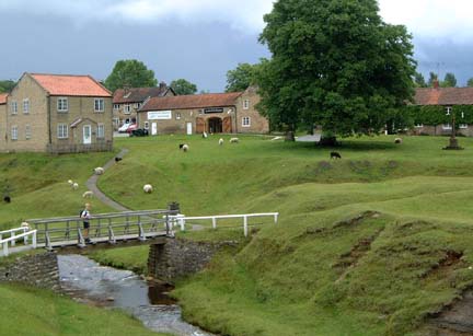 Caroline on the footbridge at Hutton-le-Hole /Photo  Arnold Underwood/July 2004